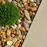 Tan landscape rock Calgary is an increasingly popular method used in both residential and commercial landscaping projects.